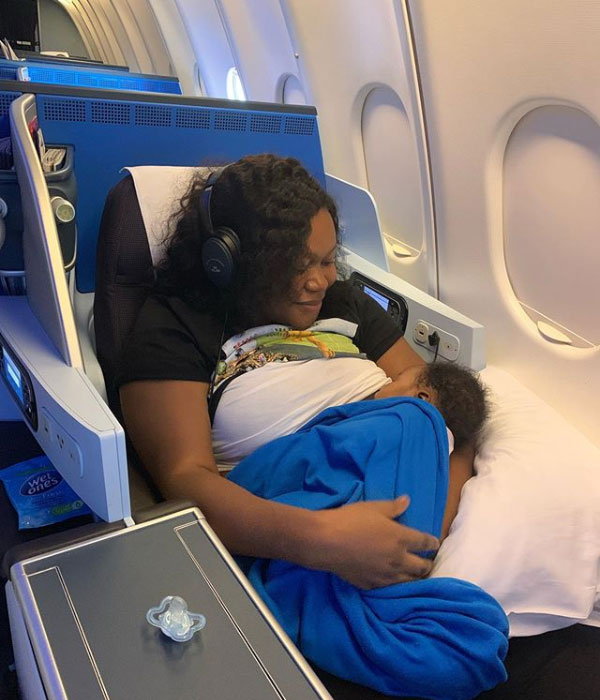 Ruth Kadiri Breast feeds in airplane 